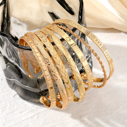 8pc Floral Accented Adjustable Textured Cuff Stack