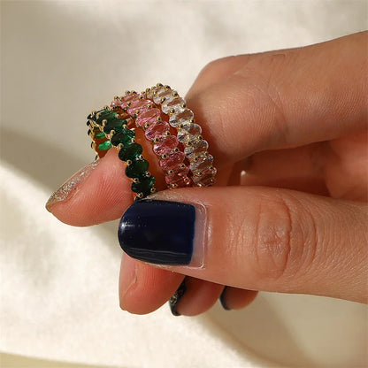 Dainty Oval Cut Diamond Adorned Ring