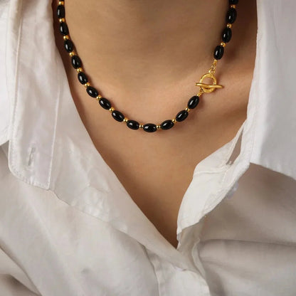 Boho Beaded Black and Gold Circle Clasp Necklace