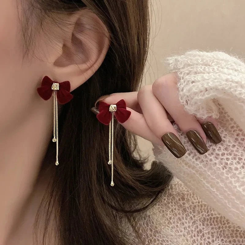Dainty Bow Gold Dangle Earrings