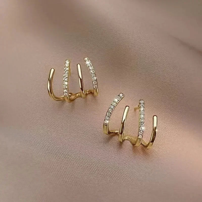 Dainty Shimmering Claw Huggie Earrings