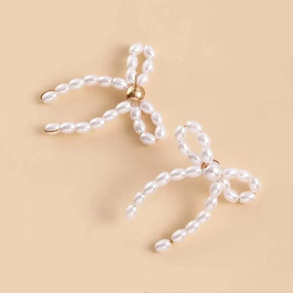 Iconic Dainty Pearl Bow Earrings