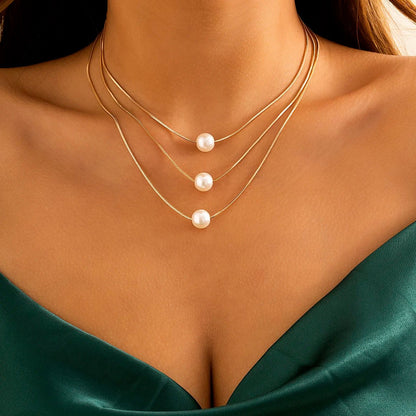 Layered Pearls Strung On Rope Necklace
