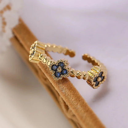 Resizable Trio Textured Floral Rings